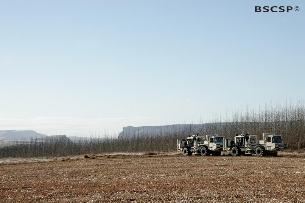 <br />Seismic "Vibroseis" trucks, also known as "Thumper" trucks, release vibrations that emit sound waves and help retrieve valuable data regarding the geology underground, as shown here at the <a href="/basalt" target="blank">Basalt Wallula project site</a>.